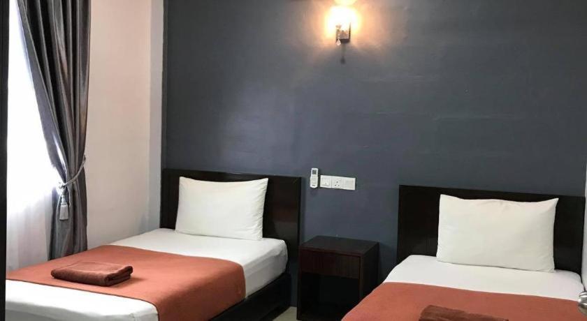 Capital O 90490 Zaques Hotel سونغاي بيتاني المظهر الخارجي الصورة